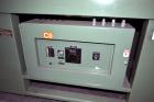 Used Signature Packaging 2412-TM Shrink Tunnel. Dual chamber shrink tunnel with twin blowers, mesh belt and variable speed 7' long x 16