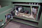 Used Signature Packaging 2412-TM Shrink Tunnel. Dual chamber shrink tunnel with twin blowers, mesh belt and variable speed 7' long x 16