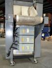 Used Besler Model T-15-9-3PH-D Mesh Belt Shrink Tunnel. Machine is capable of speeds up to 198 feet per minute. Has 9