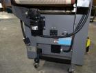 Used Besler Model T-15-9-3PH-D Mesh Belt Shrink Tunnel. Machine is capable of speeds up to 198 feet per minute. Has 9