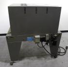 Used Beseler Shrink Tunnel, Model T-18-8M, Carbon Steel. Capable of 30-40 packages per minute, 0 to 120 feet per minute conveyor speed. Maximum product size 17’’ wide x 7’’ high. Tunnel opening measu...