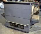 Used Besler Model T-20-19-3PH Mesh Belt Shrink Tunnel. Machine is capable of speeds up to 198 feet per minute. Has 9