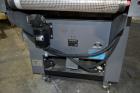 Used Besler Model T-20-19-3PH Mesh Belt Shrink Tunnel. Machine is capable of speeds up to 198 feet per minute. Has 9