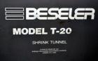 Used Besler Model T-20-19-3PH Mesh Belt Shrink Tunnel. Machine is capable of speeds up to 198 feet per minute. Has 9