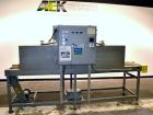 Used Great Lakes Shrink Tunnel, Model HVD-12-22-90-HP, Carbon Steel. Approximate 19’’ wide x 122’’ long solid belt, driven by a 1/2hp, 90 volt DC gear motor. Tunnel opening 25’’ wide x 17’’ tall x 90...