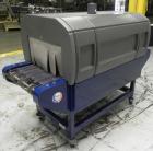 Used Lantech Model ST-900 Shrink Tunnel. Capable of speeds up to 90 feet per minute dependent on package configuaration and film. Has four zones. Chamber dimensions: 63