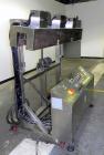 Used NAFM Heat Shrink Tunnel, Model GS-100T, Stainless Steel. Approximate 5’’ wide x 68’’ long heat section, (3) top mounted blowers. 1/2hp Gear motor raise and lower. Mounted on a stainless steel fr...