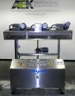 Used NAFM Heat Shrink Tunnel, Model GS-100T, Stainless Steel. Approximate 5’’ wide x 68’’ long heat section, (3) top mounted blowers. 1/2hp Gear motor raise and lower. Mounted on a stainless steel fr...