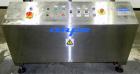 Used NAFM Heat Shrink Tunnel, Model GS-100T, Stainless Steel. Approximate 5’’ wide x 68’’ long heat section, (3) top mounted blowers. 1/2hp Gear motor raise and lower. Mounted on a stainless steel fr...