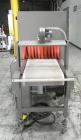 Used Omega Model SL18 Shrink Bundling System with Integrated Shrink Tunnel. Capable of up to 15-20 cycles per minute. Right angle product infeed for 4-1/2”W table top chain, infeed conveyor not inclu...