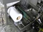 Used Omega Model SL18 Shrink Bundling System with Integrated Shrink Tunnel. Capable of up to 15-20 cycles per minute. Right angle product infeed for 4-1/2”W table top chain, infeed conveyor not inclu...