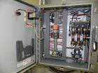 Used Omega Model SL18 Shrink Bundling System with Integrated Shrink Tunnel. Capable of up to 15-20 cycles per minute. Right angle product infeed for 4-1/2”W table top chain, infeed conveyor not inclu...