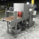 Used Omega Model SL18 Shrink Bundling System with Integrated Shrink Tunnel. Capable of up to 15-20 cycles per minute. Right angle product infeed for 4-1/2”W table top chain, infeed conveyor not inclu...