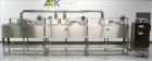 Used Sacmi Sleeve Labeling Electric Heat Tunnel. Has 3 zones, each zone has 72