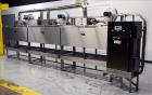 Used Sacmi Sleeve Labeling Electric Heat Tunnel. Has 3 zones, each zone has 72