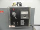 Used Shanklin Model T-7XL Single Zone Heat Shrink Tunnel. Tunnel conveyor is rated at speeds from 15 to 120 ft per minute. Has temperature controls from 50 to 500 deg. F. Has a 4-8