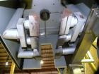 Used Sleevit Model 750 Shrink Tunnel. (4) Nozzles and 2 temperature zones. Tunnel 3/50/415 18A.Tunnel opening is 15