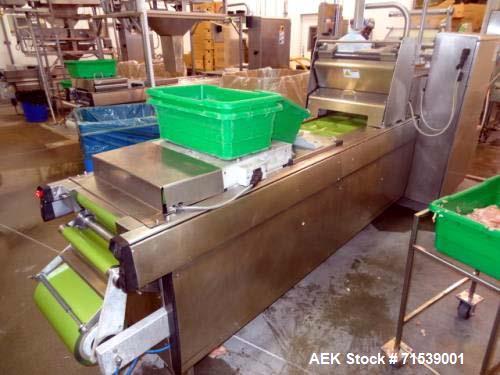 Used Multivac Darfresh Skin Packaging System, Model R175 CD. 220 volt, 3-phase, 60 Hz, 82 amp, 14.5 kW. 420mm bottom web  semi rigid. 250mm advance, 20" loading area, 14 ft. long overall. Film trim w...