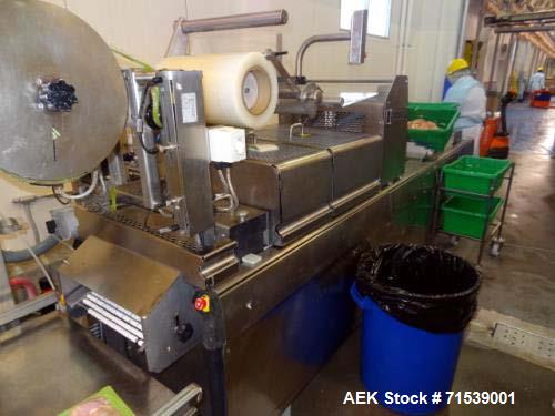 Used Multivac Darfresh Skin Packaging System, Model R175 CD. 220 volt, 3-phase, 60 Hz, 82 amp, 14.5 kW. 420mm bottom web  semi rigid. 250mm advance, 20" loading area, 14 ft. long overall. Film trim w...
