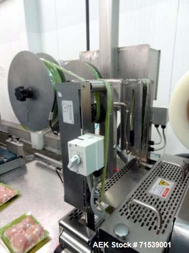 Used Multivac Darfresh Skin Packaging System, Model R175 CD. 220 volt, 3-phase, 60 Hz, 82 amp, 14.5 kW. 420mm bottom web  semi rigid. 250mm advance, 20" loading area, 14 ft. long overall. Film trim w...