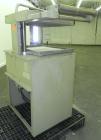 Used Ampak Shipmate II Model SF-1824A Vacuum Skin Packager. Has an 18” wide x 24” long platen size with an adjustable platen clearance of 6” to 18”. Film capacity 20” wide x 9” OD on 3” ID core. Plat...