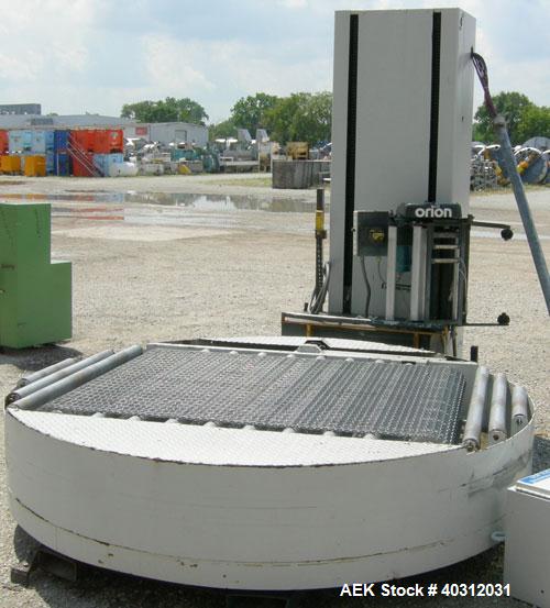 Used Infra-Pak Side Winder Automatic Stretch Wrapper, model CTA. 90" diameter turntable, counter clockwise rotation, 48" x 54" x 60" high x 20" wide film, 4000 pound load capacity. Driven by a 1 hp, ...