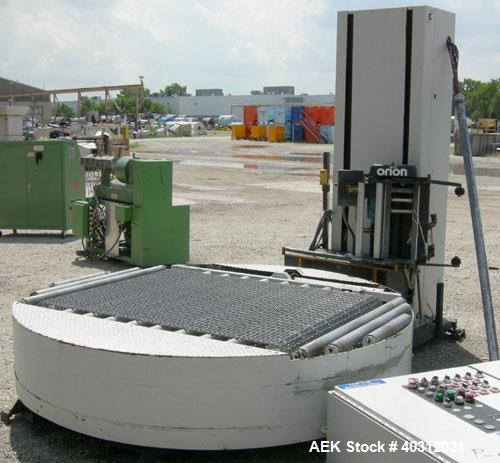 Used Infra-Pak Side Winder Automatic Stretch Wrapper, model CTA. 90" diameter turntable, counter clockwise rotation, 48" x 54" x 60" high x 20" wide film, 4000 pound load capacity. Driven by a 1 hp, ...