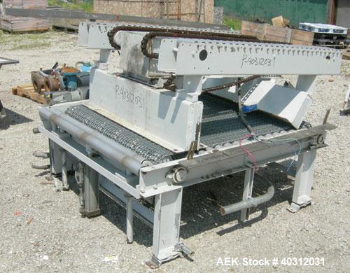 Used Infra-Pak Side Winder Automatic Stretch Wrapper, model CTA. 90" diameter turntable, counter clockwise rotation, 48" x 54" x 60" high x 20" wide film, 4000 pound load capacity. Driven by a 1 hp, ...