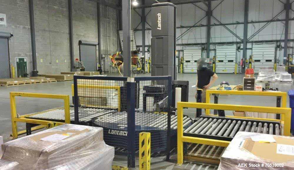 Used Lantech Auto Stretch Wrapper, Model Q Series Auto 3 Station. Powered conveyor infeed and discharge. Frame painted with Steel It application. 230-480 V / 3 ph / 60 Hz. 20" film. Includes OEM fenc...