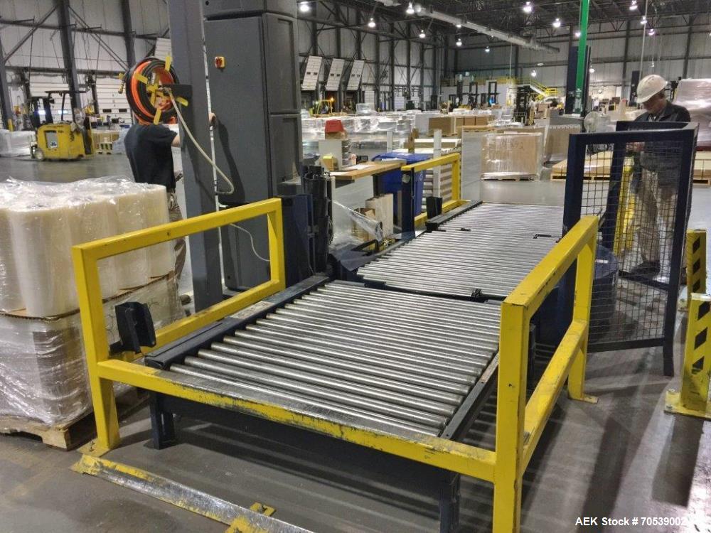 Used Lantech Auto Stretch Wrapper, Model Q Series Auto 3 Station. Powered conveyor infeed and discharge. Frame painted with Steel It application. 230-480 V / 3 ph / 60 Hz. 20" film. Includes OEM fenc...