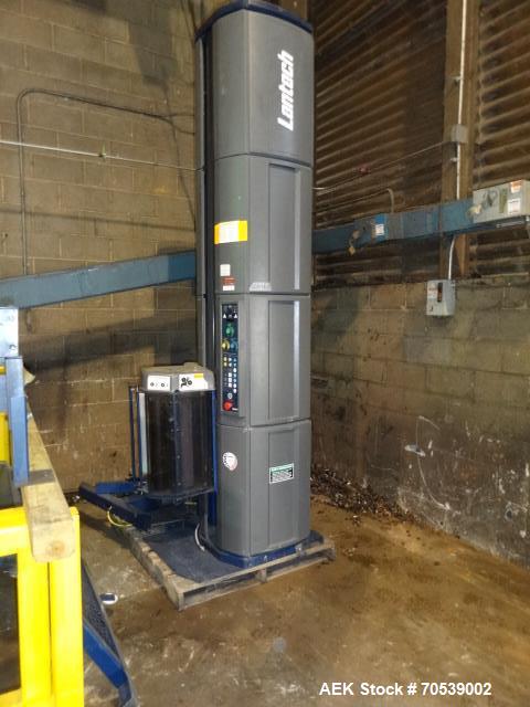Used Lantech Auto Stretch Wrapper, Model Q Series Auto 3 Station. Powered conveyor infeed and discharge. Frame painted with Steel It application. 230-480 V / 3 ph / 60 Hz. 20" film. Includes OEM fenc...