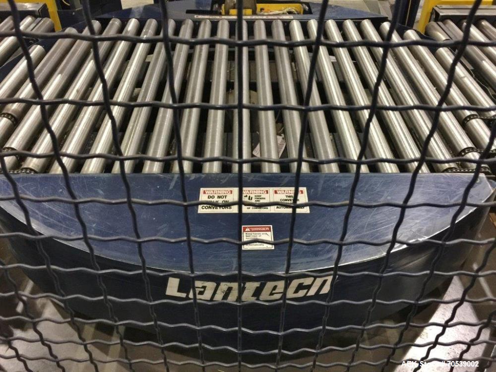 Used Lantech Auto Stretch Wrapper, Model Q Series Auto 3 Station. Powered conveyor infeed and discharge. Frame painted with Steel It application. 230-480 V / 3 ph / 60 Hz. 20" film. Includes OEM fenc...