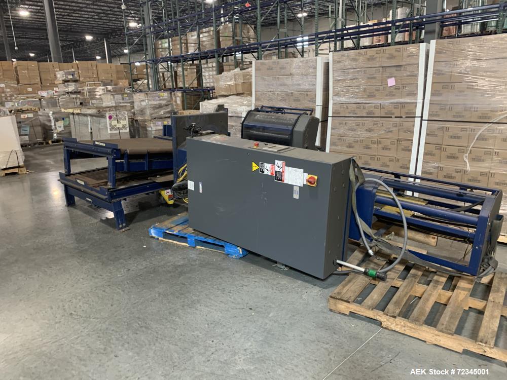 Used Lantech Automatic Stretch Wrapper, Model Q1000. Machine includes on board static eliminator, powered roller pallet indexing, touch-screen operator panel and automatic cut-off. 3/60/460V.