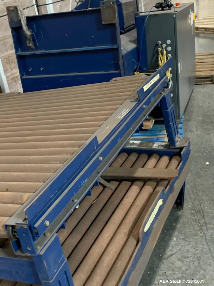 Used Lantech Automatic Stretch Wrapper, Model Q1000. Machine includes on board static eliminator, powered roller pallet indexing, touch-screen operator panel and automatic cut-off. 3/60/460V.