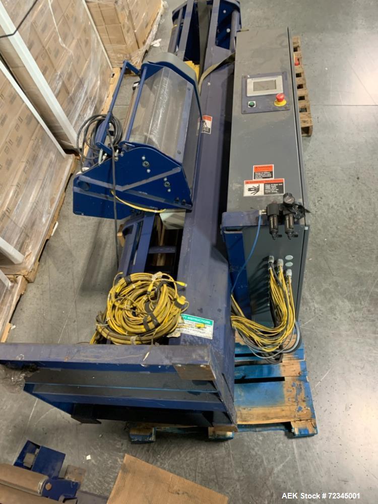 Used Lantech Automatic Stretch Wrapper, Model Q1000. Machine includes on board static eliminator, powered roller pallet indexing, touch-screen operator panel and automatic cut-off. 3/60/460V.