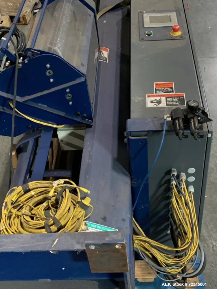 Used Lantech Automatic Stretch Wrapper, Model Q1000. Machine includes on board static eliminator, powered roller pallet indexing, touch-screen operator panel and automatic cut-off. 3/60/460V.