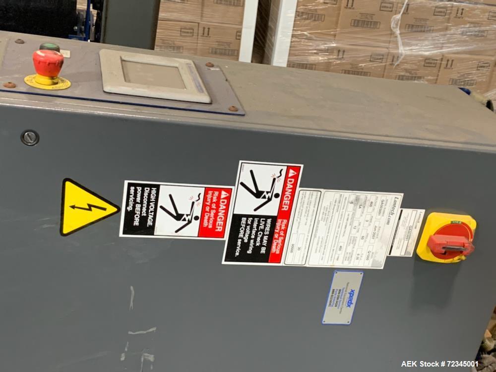 Used Lantech Automatic Stretch Wrapper, Model Q1000. Machine includes on board static eliminator, powered roller pallet indexing, touch-screen operator panel and automatic cut-off. 3/60/460V.
