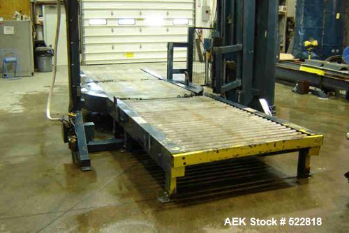 USED: Lantech stretch wrapper, series converted, products model SHASP.               Unit complete with Allen Bradley PLC, 10' powered chain driven live roller conveyor, auto stretch wrapping complet...