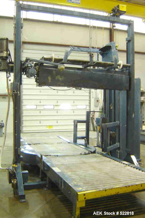 USED: Lantech stretch wrapper, series converted, products model SHASP.               Unit complete with Allen Bradley PLC, 10' powered chain driven live roller conveyor, auto stretch wrapping complet...