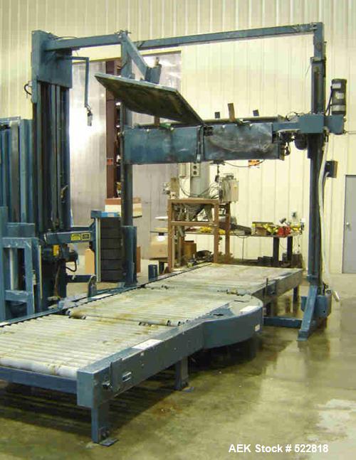 USED: Lantech stretch wrapper, series converted, products model SHASP.               Unit complete with Allen Bradley PLC, 10' powered chain driven live roller conveyor, auto stretch wrapping complet...