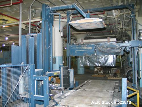 USED: Lantech stretch wrapper, series converted, products model SHASP.               Unit complete with Allen Bradley PLC, 10' powered chain driven live roller conveyor, auto stretch wrapping complet...