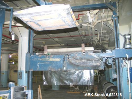 USED: Lantech stretch wrapper, series converted, products model SHASP.               Unit complete with Allen Bradley PLC, 10' powered chain driven live roller conveyor, auto stretch wrapping complet...