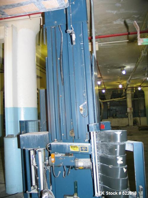 USED: Lantech stretch wrapper, series converted, products model SHASP.               Unit complete with Allen Bradley PLC, 10' powered chain driven live roller conveyor, auto stretch wrapping complet...