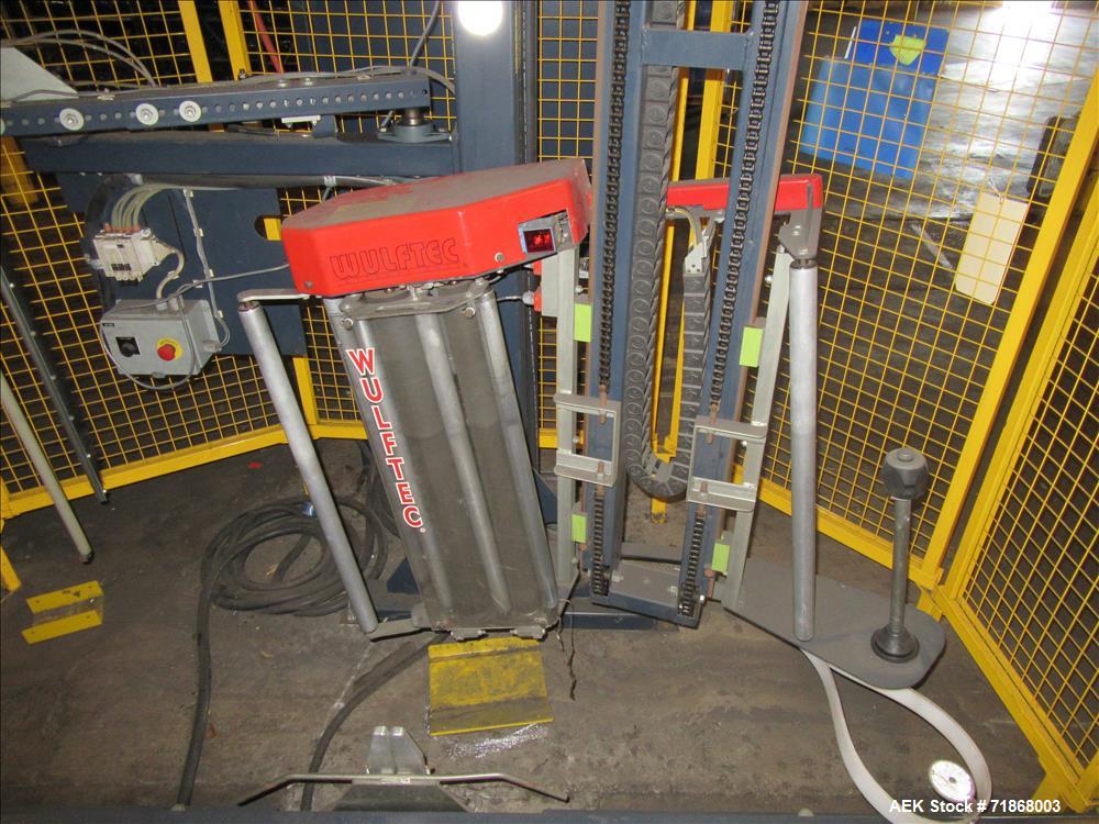 Used Wulftec Model WRT-150 Semi-automatic Rotary Arm (Orbital) Stretch Wrapper. Machine is capable of speeds up to 50 loads per hour. Has a maximum load size of 54" long x 54" wide x 80" high. Has va...