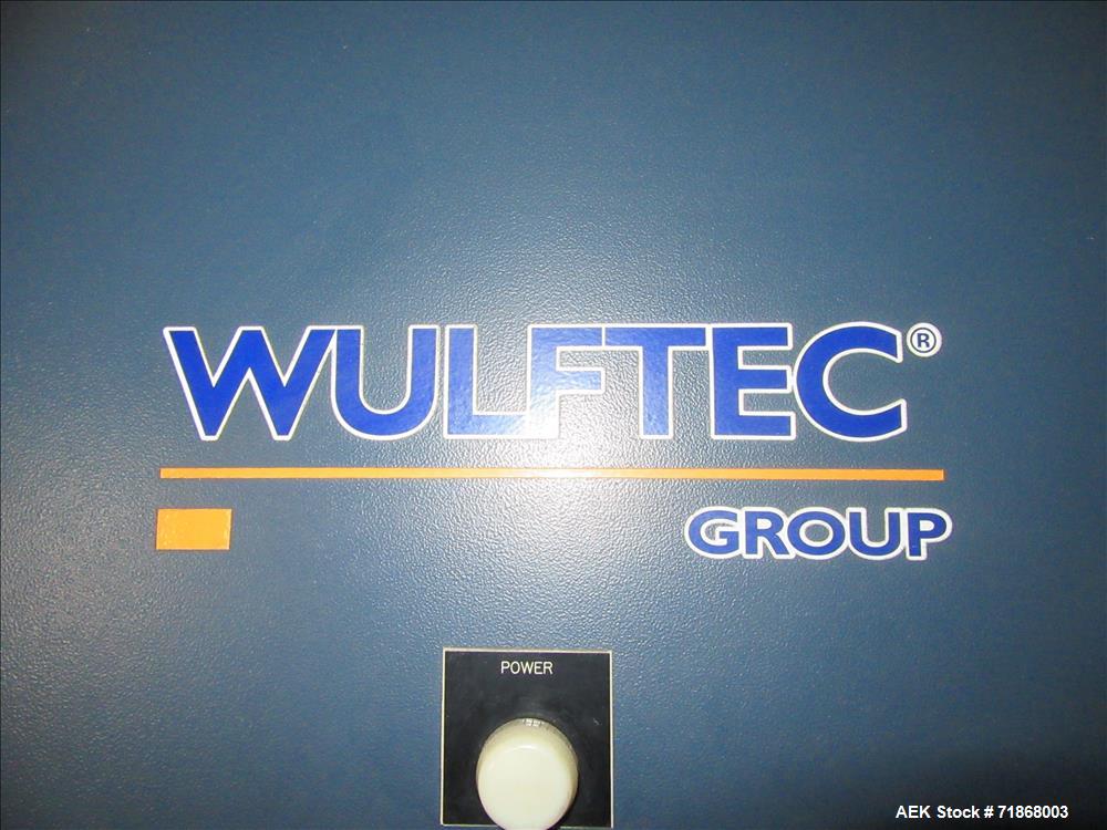 Used Wulftec Model WRT-150 Semi-automatic Rotary Arm (Orbital) Stretch Wrapper. Machine is capable of speeds up to 50 loads per hour. Has a maximum load size of 54" long x 54" wide x 80" high. Has va...