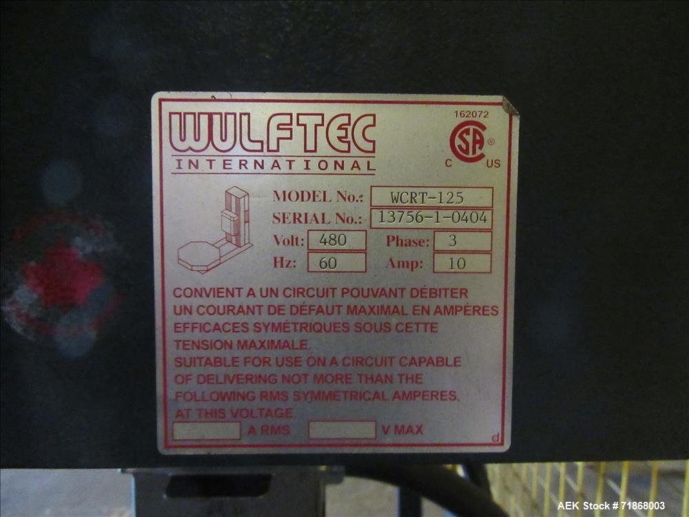Used Wulftec Model WRT-150 Semi-automatic Rotary Arm (Orbital) Stretch Wrapper. Machine is capable of speeds up to 50 loads per hour. Has a maximum load size of 54" long x 54" wide x 80" high. Has va...