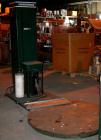 Used Infra Pak Sidewinder Platform Stretch Wrapper. Maximum load 3000 pounds. 5' diameter turntable, approximate 6' wrap height, average cycle time 2 minutes. Table driven by an approximate 1/2 hp ge...
