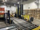 Used-Lantech Stretch Wrapper, Model Q1000 Automatic operation with powered infeed and discharge pallet conveyors, 18