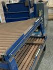 Used-Lantech Automatic Stretch Wrapper, Model Q1000. Machine includes on board static eliminator, powered roller pallet inde...