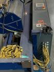 Used-Lantech Automatic Stretch Wrapper, Model Q1000. Machine includes on board static eliminator, powered roller pallet inde...